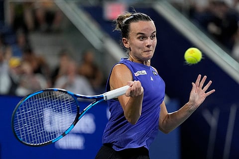 US Open 2024: Clara Burel, of France, returns a shot to Victoria Azarenka, of Belarus